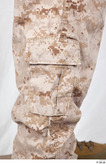  Photos Army Man in Camouflage uniform 12 21th century Army desert uniform lower body pocket trousers 0001.jpg